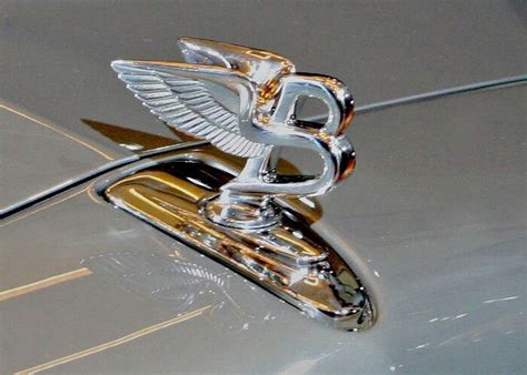 Bentley logo | Car hood ornaments, Bentley logo, Car badges