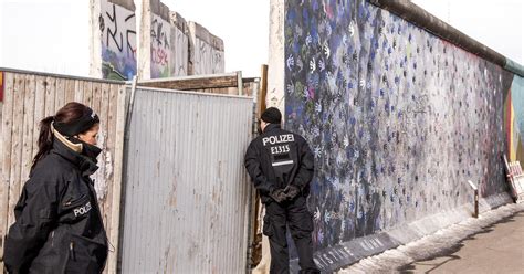 Despite protests, more of the Berlin Wall torn down - CBS News