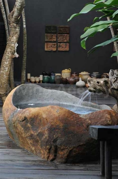 27 Stunning Stone Bathtub Designs