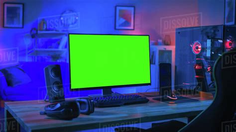 Powerful personal computer gamer rig with mock up green screen monitor ...