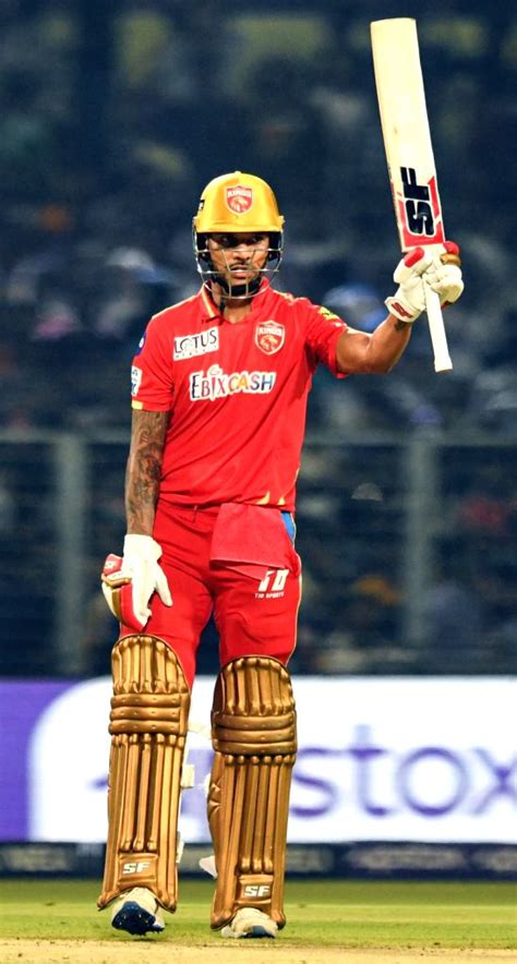 PBKS' captain Shikhar Dhawan celebrates his half-century during the IPL ...