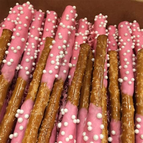 Chocolate dipped pretzel sticks for baby shower! It's a girl! | Chocolate dipped pretzels ...