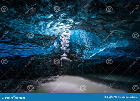 Blue ice cave in Iceland stock image. Image of glacier - 86116757