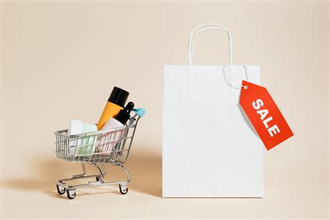 Shopping Cart Next to a Shopping Bag · Free Stock Photo