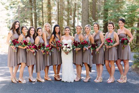 All 12 bridesmaids wore mocha-colored dresses that fell right above the knee, but each picked ...