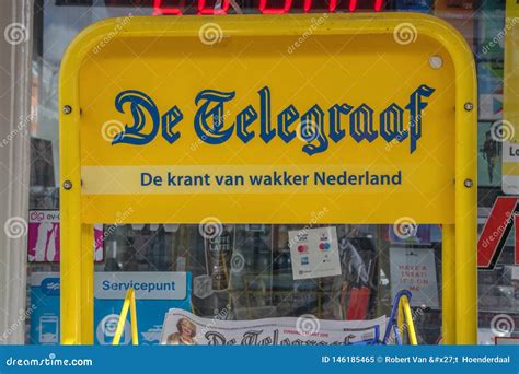 Billboard Selling De Telegraaf Newspaper at Amsterdam the Netherlands 2019 Editorial Image ...