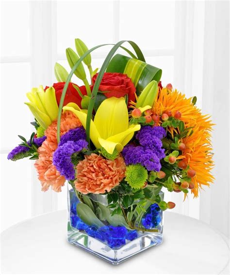 17 best Rainbow centerpiece images on Pinterest | Flower arrangements ...