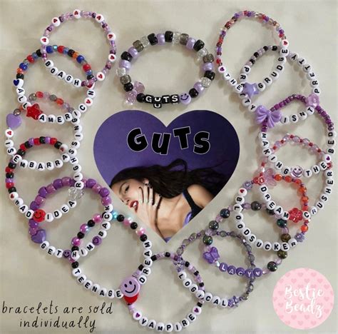 a heart made out of bracelets with the words guts on it and an image of ...