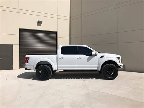 White Lifted Ford F-150 Boasts Contrasting Black Additions — CARiD.com Gallery