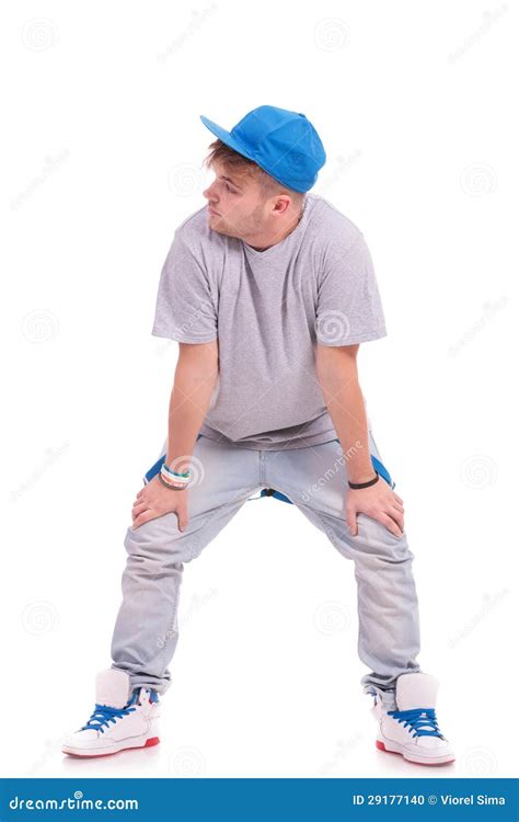 Dancer With Hands On Knees Stock Photo - Image: 29177140