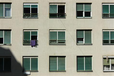 Close-Up Shot of Apartment Building Windows · Free Stock Photo