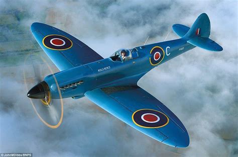 Monumental: The blue coloured Spitfire is powered by the Rolls Royce ...