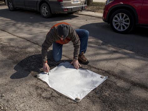 Photos: Pothole art -- Chicago Tribune