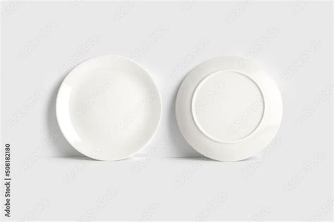 Empty blank white plate mockup isolated on white background. 3d ...