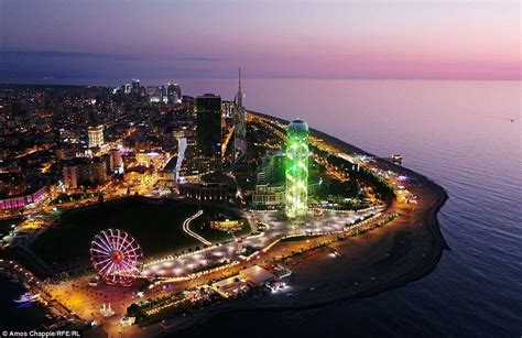 After dark, the city of Batumi glows with neon lights. Batumi, whose beaches are less appealing ...