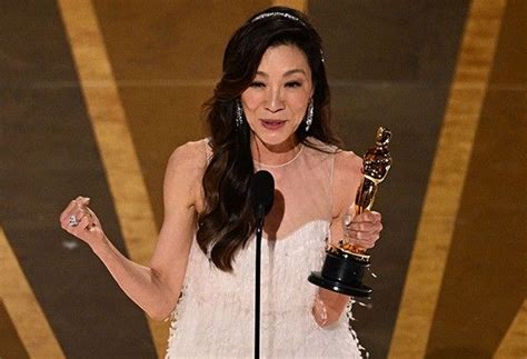 Michelle Yeoh brings Oscar to mother Janet, visits father's grave in Malaysia | Philstar.com