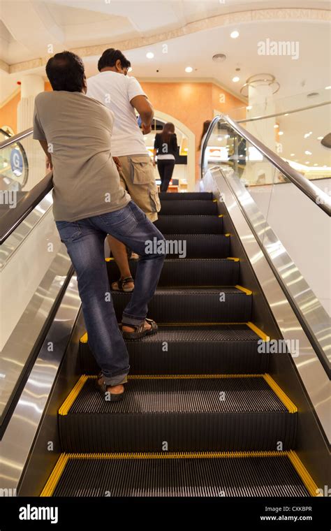 People on an Escalator in a Shopping Mall in Bangkok Stock Photo - Alamy