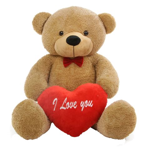 a teddy bear holding a red heart with the words i love you written on it