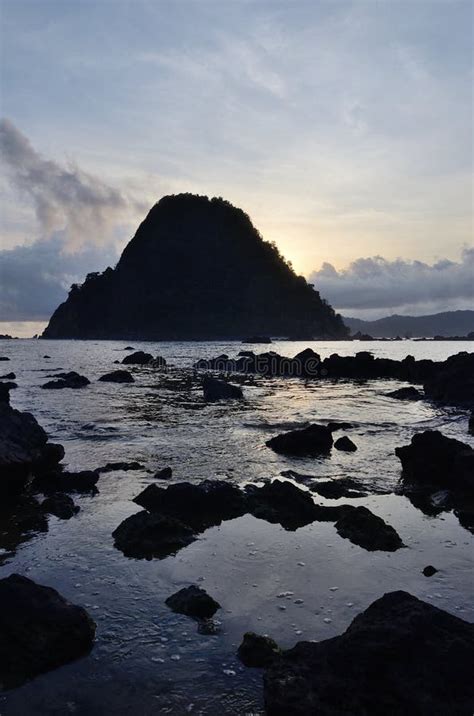 Sunset Over Pulau Merah Beach Stock Image - Image of holiday, coastal: 236423453