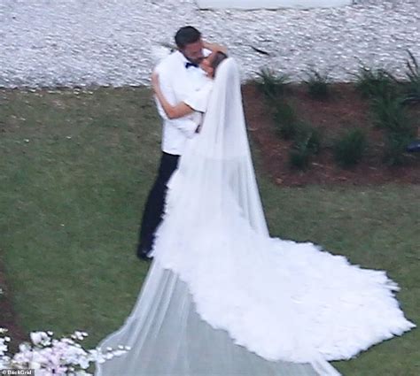 Bennifer wedding: Radiant JLo in white dress kisses Ben Affleck on wedding day | Daily Mail Online