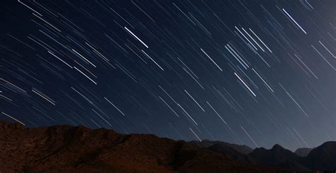 Star trails over the mountains in night sky image - Free stock photo ...