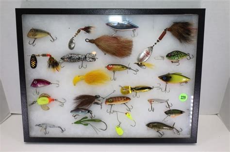 GLASS TOP DISPLAY CASE WITH 23 FISHING LURES | Live and Online Auctions on HiBid.com