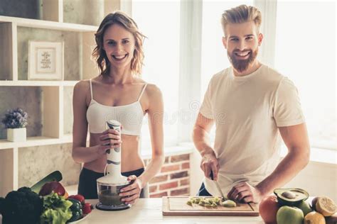 Couple Cooking Healthy Food Stock Photo - Image of beard, cooking: 90474512