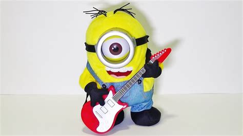 Minions Stuart Rock N Roll singing, playing his guitar and dancing ...