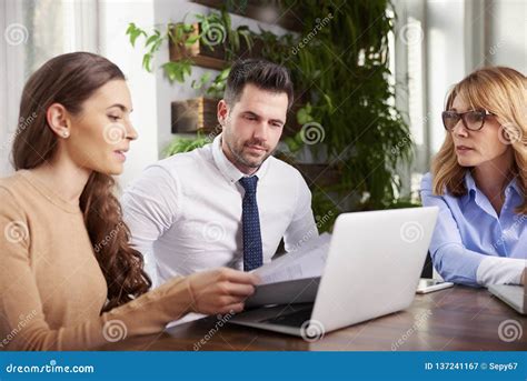 Group of Business People Using Laptop while Working in the Office Stock Image - Image of ...