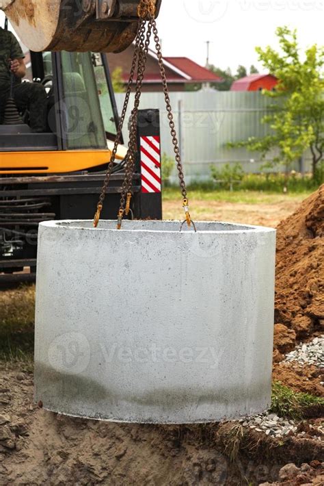 Installation of underground tank for sewage system 15743257 Stock Photo at Vecteezy