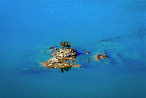 Kayaking on Diablo Lake Photograph by Michael Sedam - Pixels