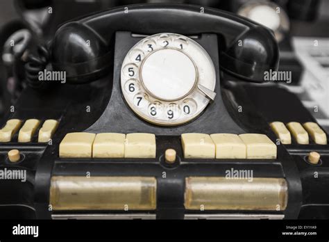 vintage black telephone isolated on a white background Stock Photo - Alamy