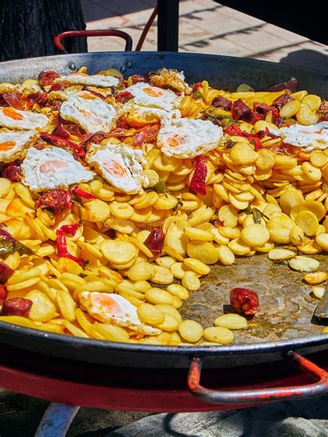 Spanish Eggs with Chorizo, Potatoes and Peppers To the Frying Pan. Stock Photo - Image of ...