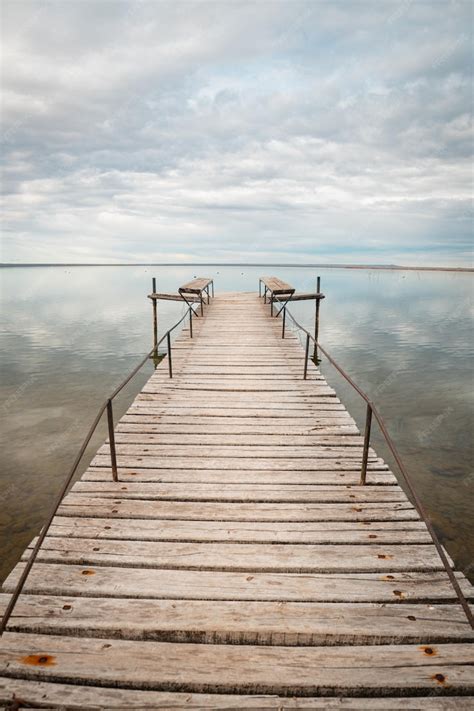 Premium Photo | Old wooden dock on lake