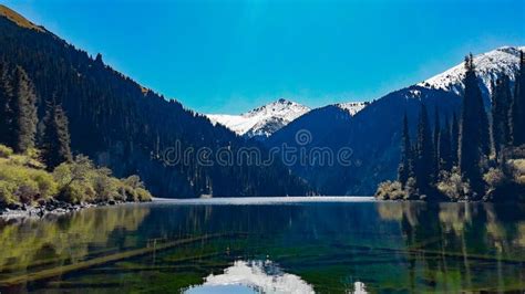 Lake and Mountains of Kazakhstan Stock Photo - Image of tree, autumn ...