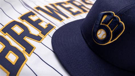 Brewers bring back ball-in-glove logo, unveil new retro-inspired ...