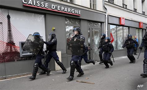 Police Car, Bank Attacked As Tensions Erupt At Anti-Cop Protest In Paris