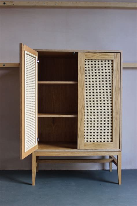 Handmade ratan cane cabinet | Furniture, Diy storage headboard, Rattan