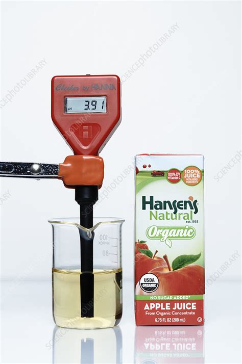 pH of Apple Juice - Stock Image - C039/1226 - Science Photo Library