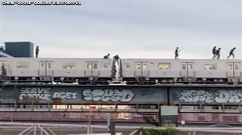 Subway surfers caught on video walking atop Brooklyn J train headed ...