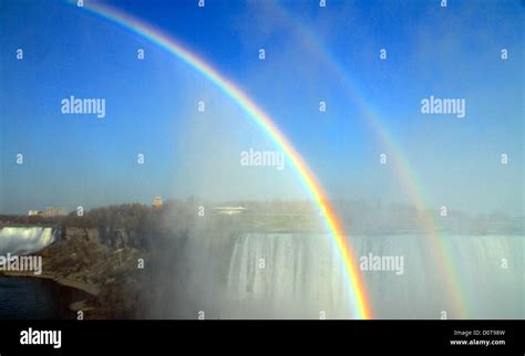 Rainbow on Niagara Falls Stock Photo - Alamy