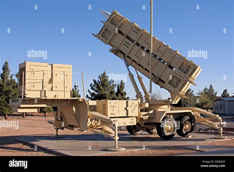 A Patriot missile battery labeled 'SCUD Buster' missile park outside ...