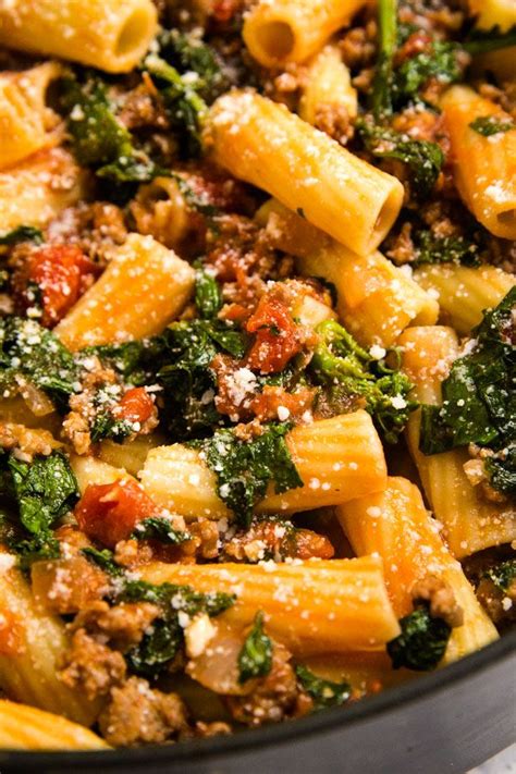 Spicy Sausage Pasta with Rapini is an easy and delicious dinner that will have everyone fight ...