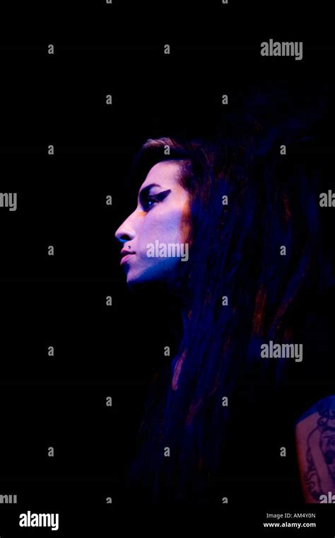 Amy Winehouse performing live Stock Photo - Alamy