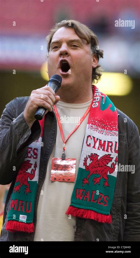 Bryn Terfel CBE, Welsh bass-baritone opera singer in full voice with a Welsh scarf around his ...