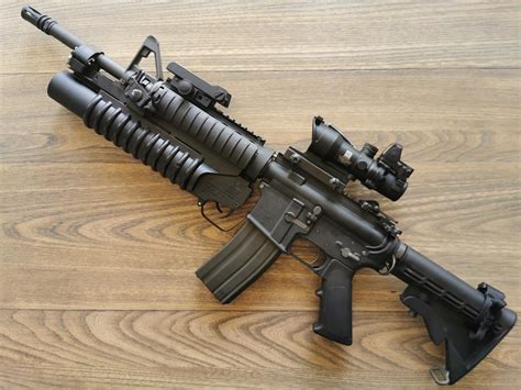 M203 grenade launcher colt marking, barrel mounted on GHK m4a1 gbb, Marine marking, all blackout ...