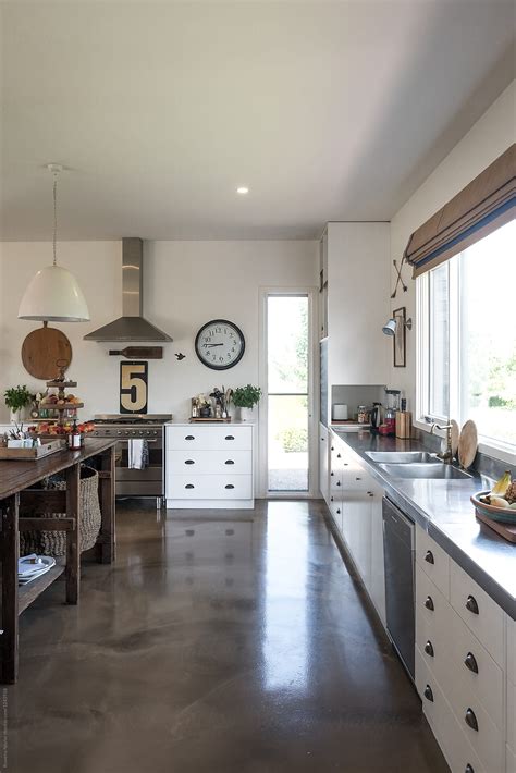 "Styled Kitchen With Polished Concrete Flooring" by Stocksy Contributor ...