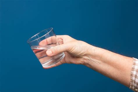 Glass of Water in Clear Glass Cup Stock Photo - Image of fingernail ...