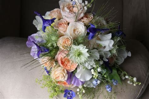 love in the mist bouquet - Google Search | Blue wedding bouquet ...