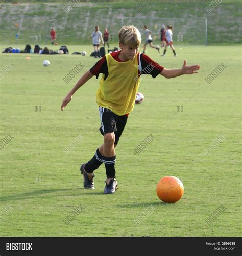 Boy Kicking Soccer Image & Photo (Free Trial) | Bigstock